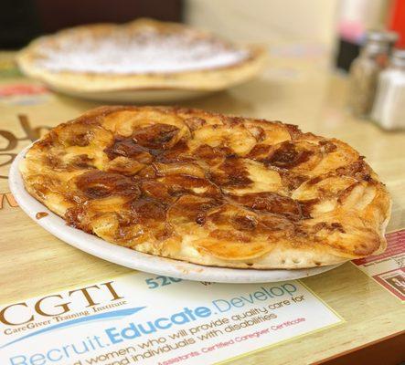 Apple Pancake with an order of extra apples and nuts.