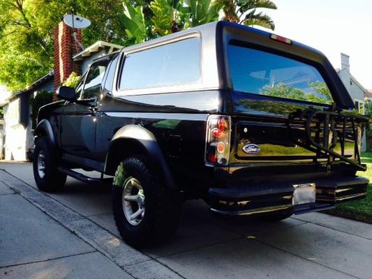 My '96 Bronco. Full repaint and custom body work by Pro Am. New headlights, taillights, fender flares and nerf bars. Luv it!!!