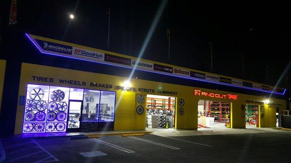 Beautiful night view of in and out tire Open til 8pm 7 days a week!!!