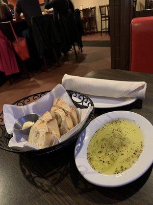 Fresh baked bread, tasty olive oil and proprietor's home made butter.