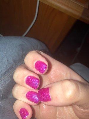 My glittery red-violet manicure on my right hand.