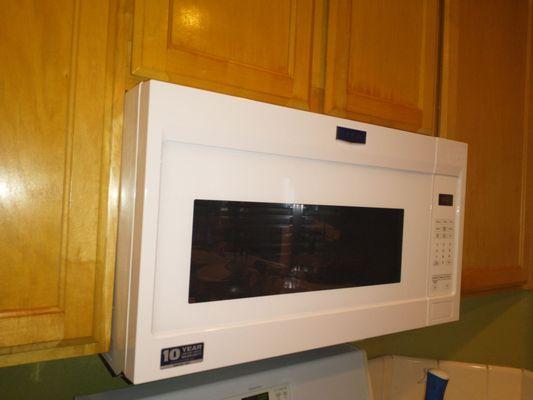 Over the range microwave installation.