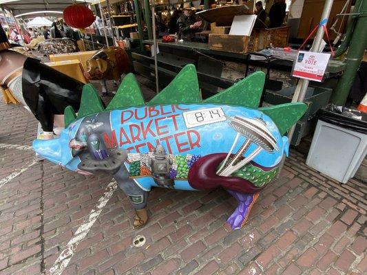 Today is the Harvest Festival and the pigs are on parade in the Public Market Center.