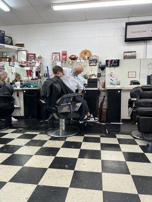 Mr Bobby cutting hair