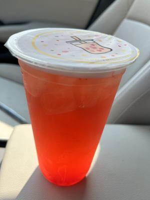 Strawberry ice tea with strawberry boba