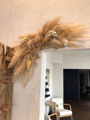 A beautiful pampas and flower arrangement.