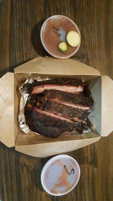 Ribs with "Sweet Heat" and "Mikes BBQ" Sauces and some complimentary smoked pickles.( I ate one before the pic...)