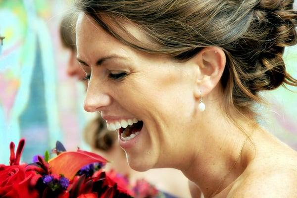 A truly happy moment as the wedding party prepared to enter the reception hall.