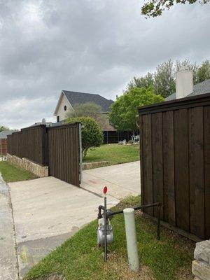 Rear entry driveway gate.