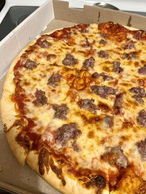 Sausage pizza with extra cheese