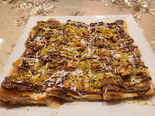 Feteer with Nutella, walnuts, coconut and pistachios