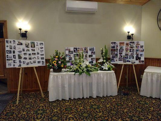 Beautiful memorial table set up for photos of our loves one