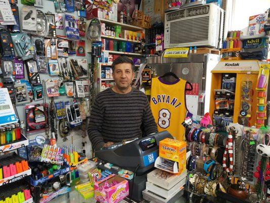 Sam the man at his water shop and convenience store.