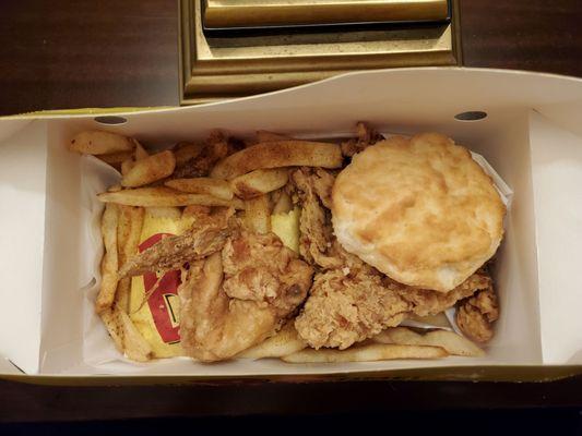 White meat 2 piece meal with a biscuit and fries