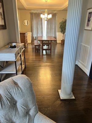 New hardwood in dinning room and refinished flooring in hallway. It looks like brand new flooring in every space that had existing hardwood