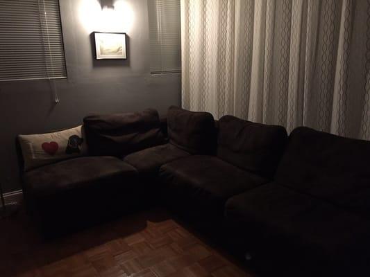 Relaxing couches. Love the dim lights:)