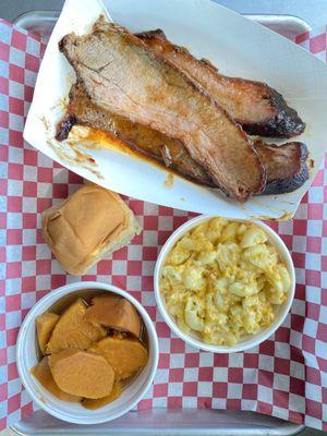 Brisket with mac and cheese and yams.