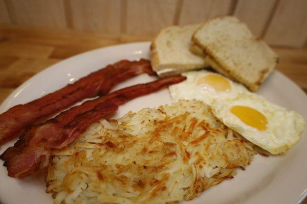 Two Egg Breakfast with Bacon, Hashbrowns and Toast