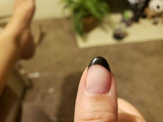 When I asked her to fix it she told me   No, that's the shape of my nail causing the polish to be uneven