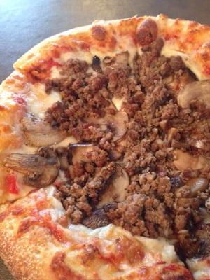 Super loaded up hamburger & mushroom baby pizza