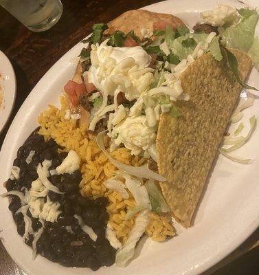 Choice of two with rice and beans, tostada, and taco