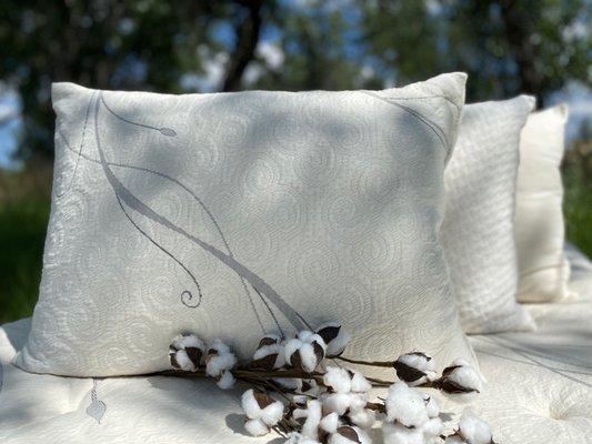 Organic Cotton Pillow protector with woolly bolas fill.