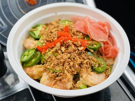 Soba noodle/shrimp bowl w/jalapeño, onion, avocado, cucumber, edamame pickles ginger topped w/ masago :)'