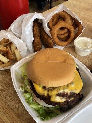 Over cooked cheeseburger, cold fries and onion rings, but piping hot fried pickles!!