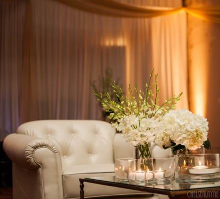 Dendrobium orchids paired with soft white hydrangeas were the perfect touch to this elegant wedding.