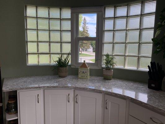 Our installers did a fine job with the curved wall and Cambria Quartz Berwyn counter tops!