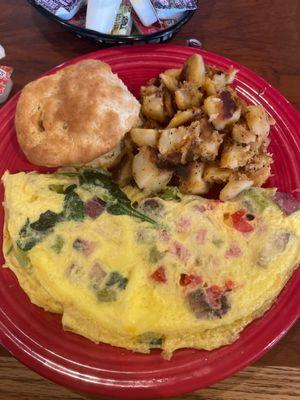 Gardener omelette with hash browns and biscuit