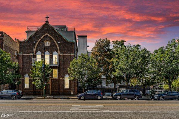 Located in the West Town neighborhood of Chicago, this one-of-a-kind townhome is perfectly retrofitted into the front of a church