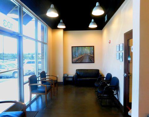 dentist university area charlotte patient sitting