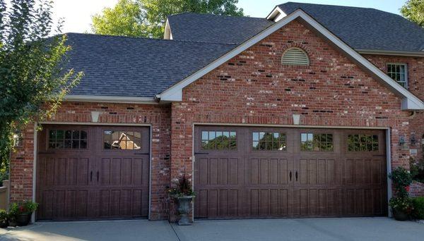 Our beautiful wood tone garage door with optional glass in top section