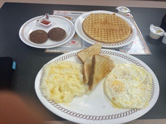 All star special (2 eggs over easy toast, grits, waffle, sasuage)