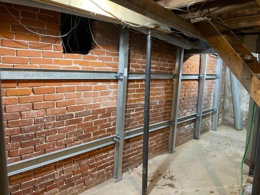 PowerBraces installed to keep the walls stable and overtime correct bowing.