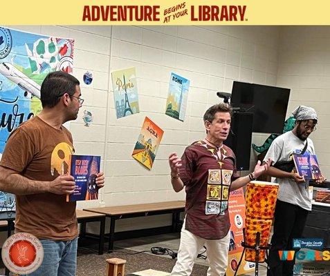 "Adventure begins at the library" event with another educator.