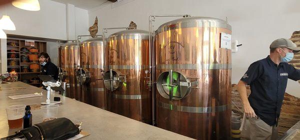 Beautiful copper equipment behind the bar.