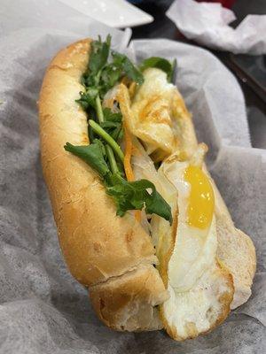 Meatball banh mi with two eggs.