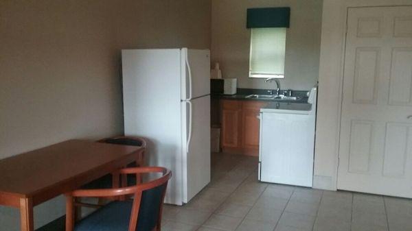 Kitchen area of our Deluxe Suites. Plenty of room for a family or cozy enough for a small vacation