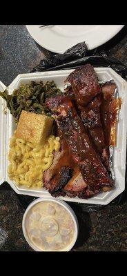 Pork ribs, brisket, greens, macaroni, corn bread and banana pudding.