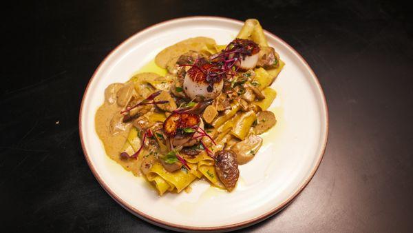 Handmade Pappardelle noodles with Scallops w/ heavy cream, white wine sauce, porcini mushrooms and garlic