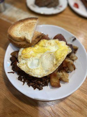 Eggs, brisket, potatoes, toast