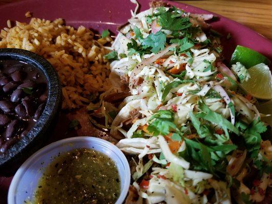 Carnitas taco on corn tortilla. Very good, tender, meaty, with coleslaw.