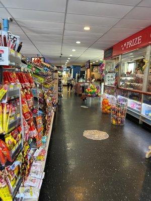 This is a convenience store and an arcade & gas station all in one!