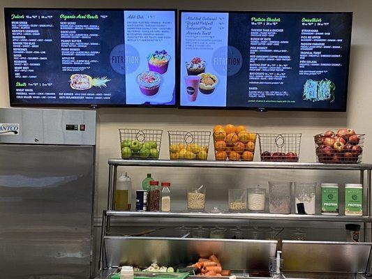 Digital menu and fresh ingredients on display