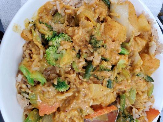 Yellow curry w/veggies over veggie fried rice