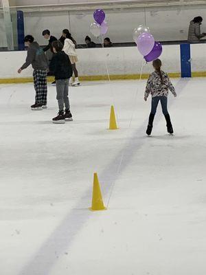 Ballon's on a cone, poor attempt to make event festive.