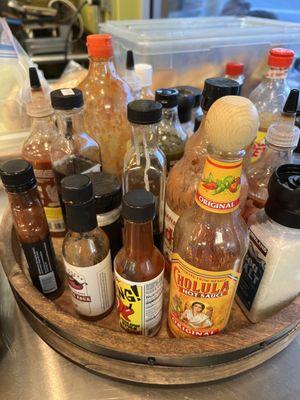 Check out all the hot sauces available for the sandwiches.  So many choices.