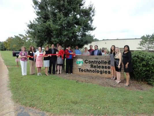 The CRT team poses during our ribbon cutting event.